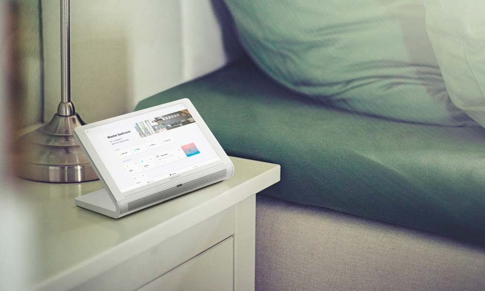 Crestron interface on tablet next to bed