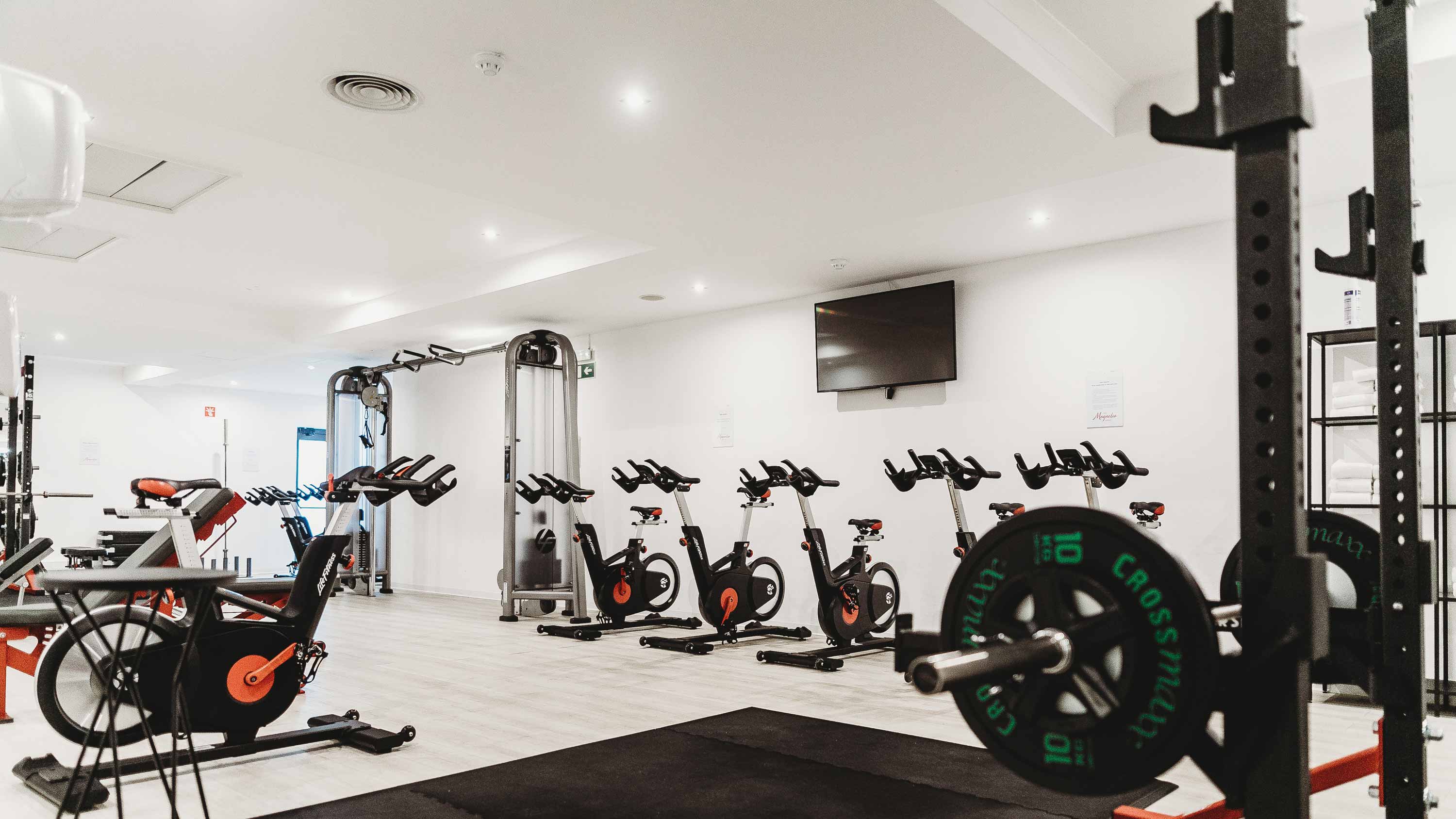 home gym with white walls and ceiling