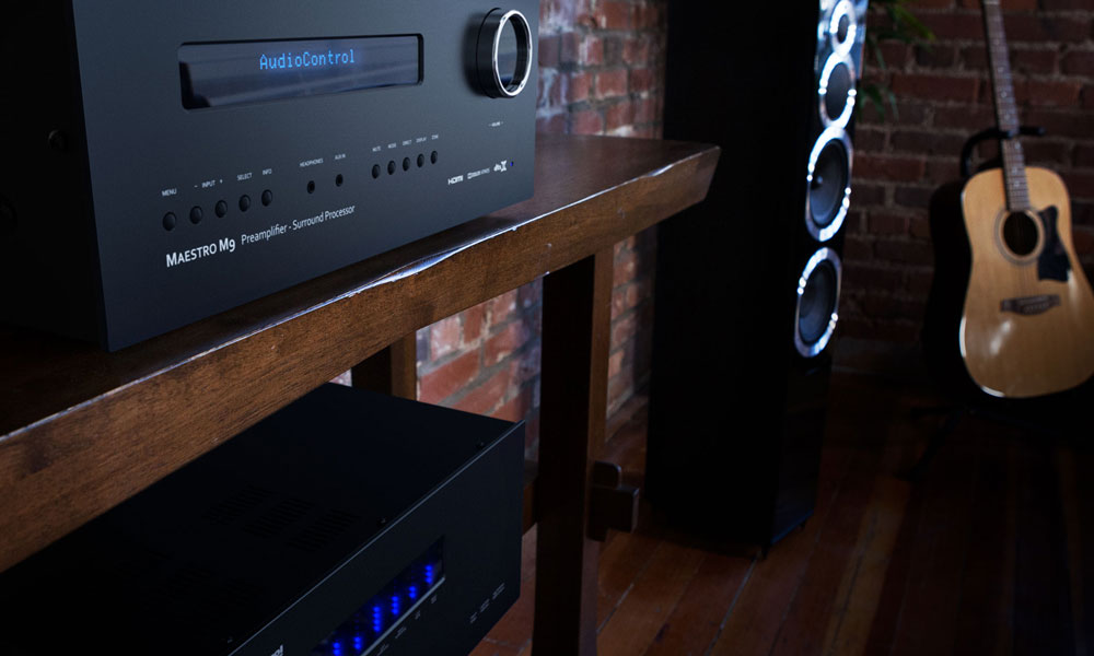 Audio Control amplifier on a wooden table