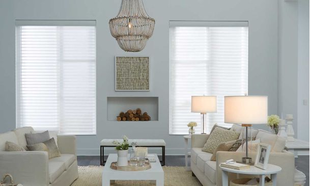 lutron shading control in a grey living room